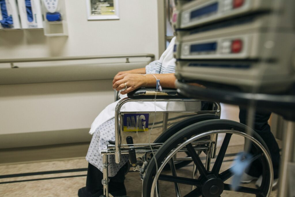 Patient leaving hospital with caregiver support and transition to home recovery